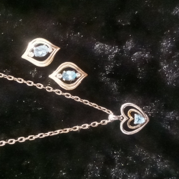 sterling silver Jewelry - Polished sterling silver 925 with gold vermeil 14k earring w/aqua marine stone.